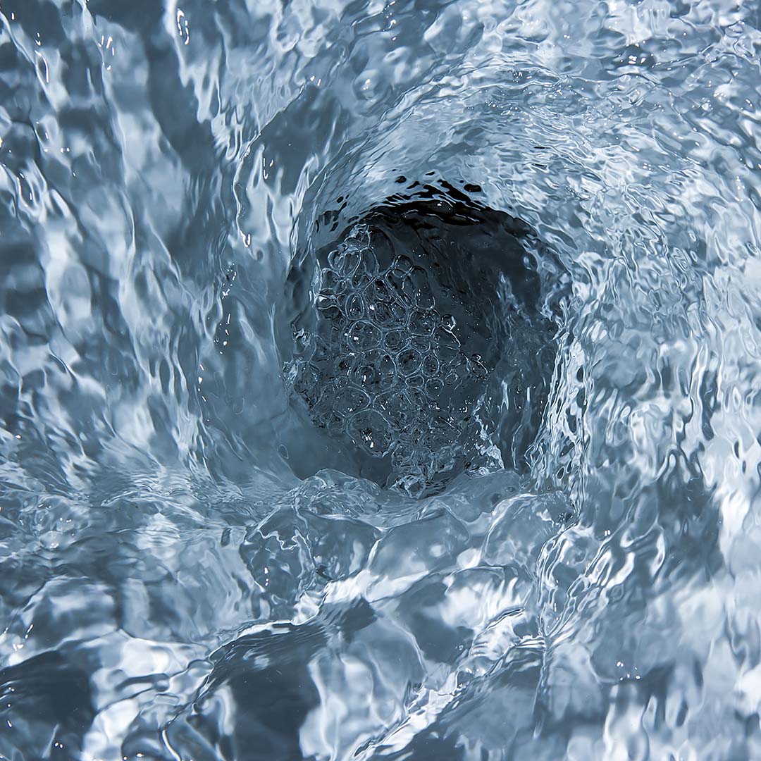 Water draining down a toilet