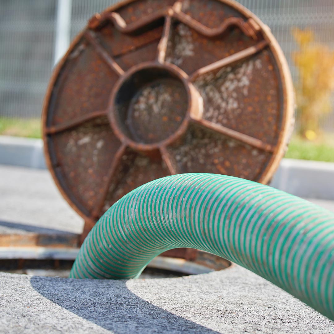 green tube in a septic tank