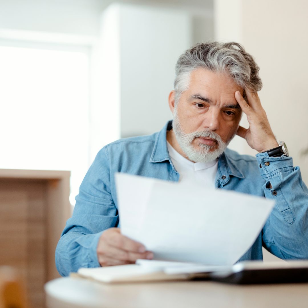 guy looking at water bill