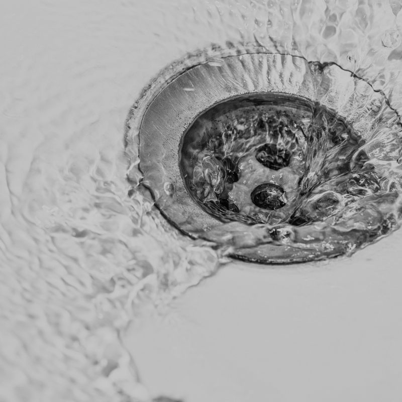 Water flowing down a drain