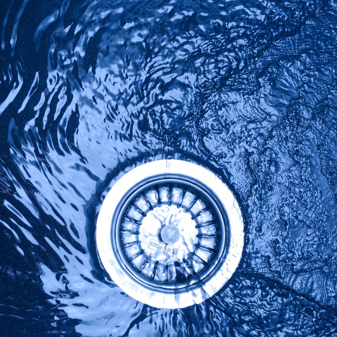 Water flowing down a clean drain
