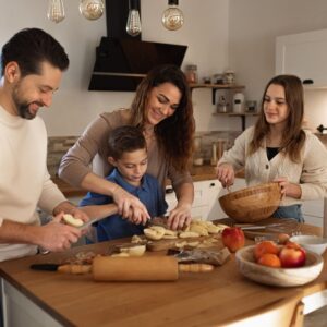 Family at home making dinner